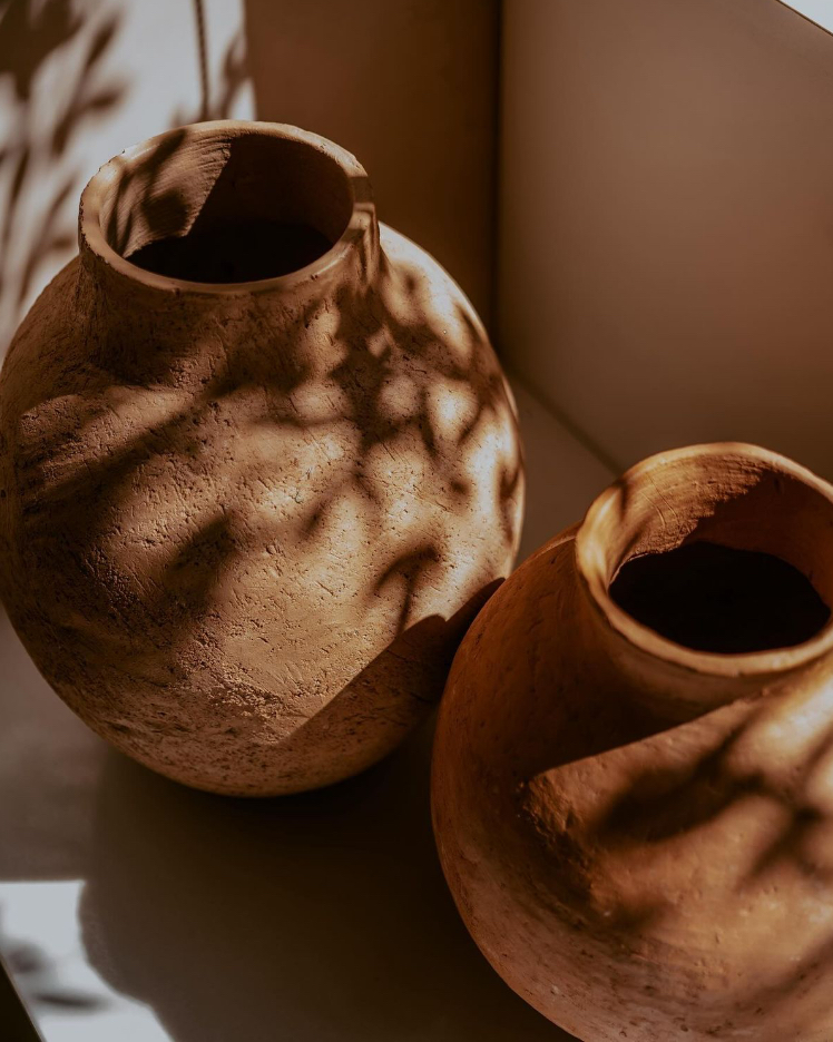 Handmade vessels in warm afternoon light